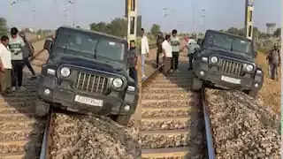 watch:-stunt-with-thar-on-railway-tracks-goes-wrong-after-vehicle-gets-stuck